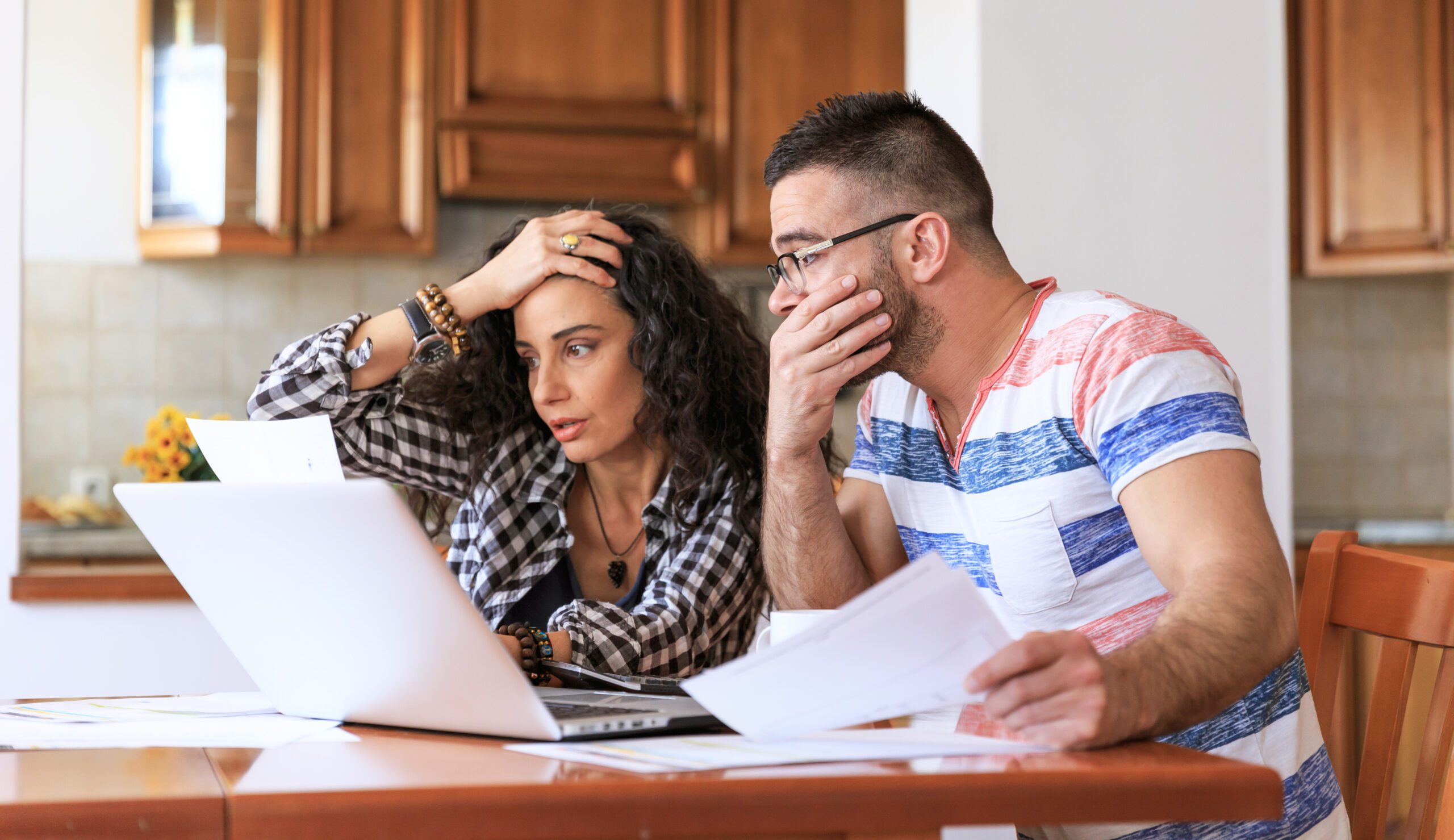 Couple receiving home bills