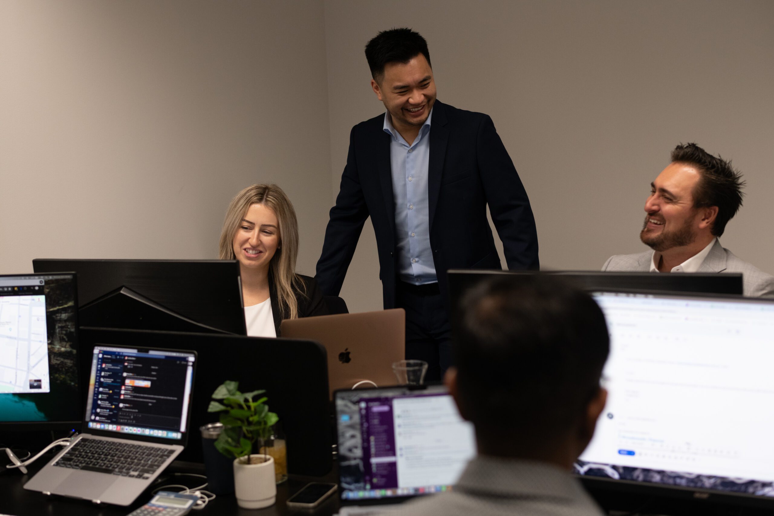 colleagues at the office laughing